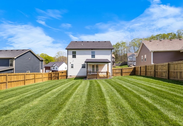 1145 Racker Dr, Clarksville, TN 37043 - rear view of property featuring a lawn, a fenced backyard, and a residential view