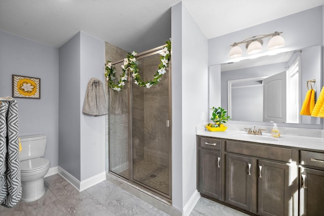 1145 Racker Dr, Clarksville, TN 37043 - bathroom with toilet, a shower stall, marble finish floor, and vanity