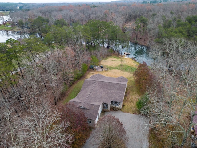 bird's eye view with a water view and a view of trees