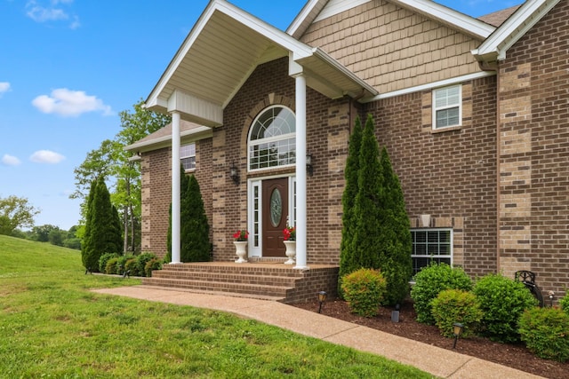 629 Natalie Ln, Spring Hill, TN 37174 - doorway to property with a lawn and brick siding