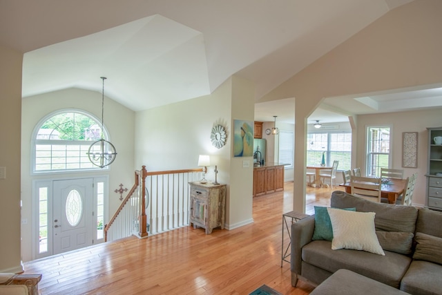 629 Natalie Ln, Spring Hill, TN 37174 - living area featuring an inviting chandelier, light wood-style flooring, and high vaulted ceiling