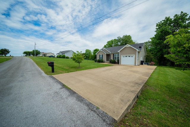 215 Desperado Ave, Pulaski, TN 38478 - single story home with a garage, driveway, and a front yard
