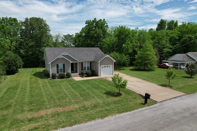 215 Desperado Ave, Pulaski, TN 38478 - ranch-style house featuring a garage, concrete driveway, and a front lawn