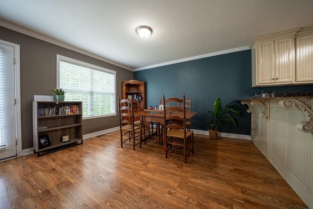 215 Desperado Ave, Pulaski, TN 38478 - dining room with baseboards, ornamental molding, and wood finished floors