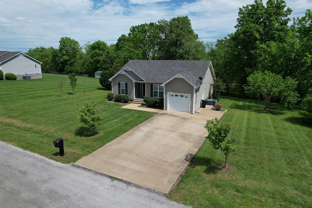215 Desperado Ave, Pulaski, TN 38478 - single story home with concrete driveway, an attached garage, and a front lawn
