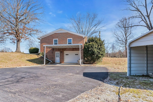 garage featuring driveway
