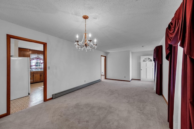 unfurnished room featuring baseboards, a notable chandelier, light carpet, and baseboard heating