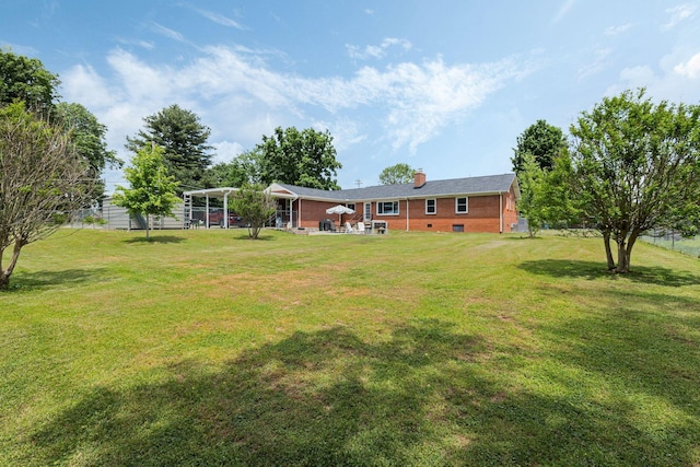 view of yard featuring a patio area