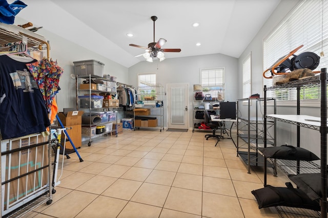 interior space with ceiling fan