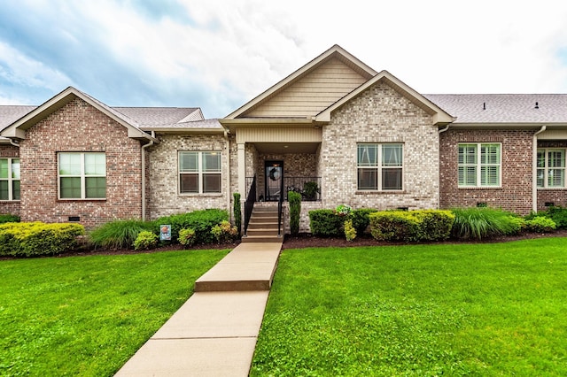 142B Odie Ray St, Gallatin, TN 37066 - view of front of house with brick siding, crawl space, a shingled roof, and a front yard
