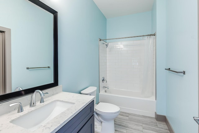 full bathroom featuring vanity, toilet, and shower / bath combination with curtain