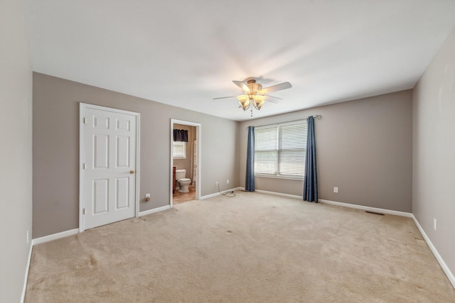 447 Canaan Rd, Columbia, TN 38401 - unfurnished bedroom with carpet flooring, connected bathroom, and visible vents