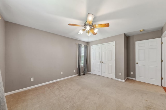 447 Canaan Rd, Columbia, TN 38401 - unfurnished bedroom with a ceiling fan, baseboards, carpet, and a closet