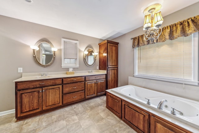 447 Canaan Rd, Columbia, TN 38401 - full bathroom with a whirlpool tub, a sink, double vanity, and a healthy amount of sunlight