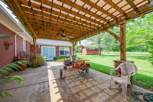 447 Canaan Rd, Columbia, TN 38401 - view of patio / terrace with a storage shed, a pergola, a ceiling fan, and an outdoor structure