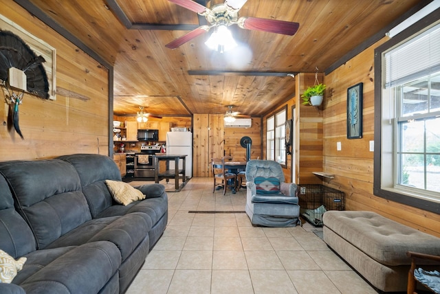 4231 Lylewood Rd, Indian Mound, TN 37079 - living room with a ceiling fan, wooden walls, wooden ceiling, and a healthy amount of sunlight