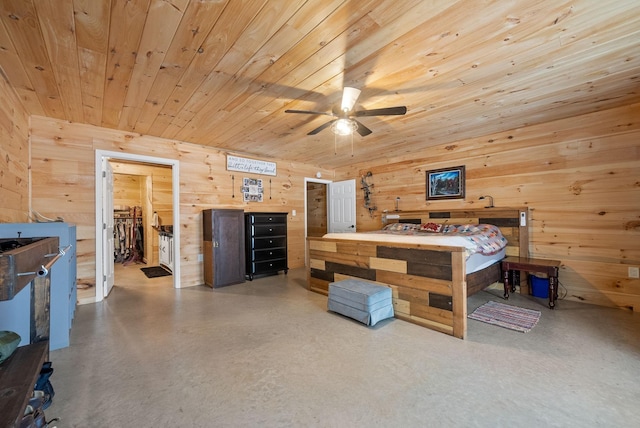 4231 Lylewood Rd, Indian Mound, TN 37079 - bedroom featuring wooden walls, wooden ceiling, finished concrete flooring, and a ceiling fan