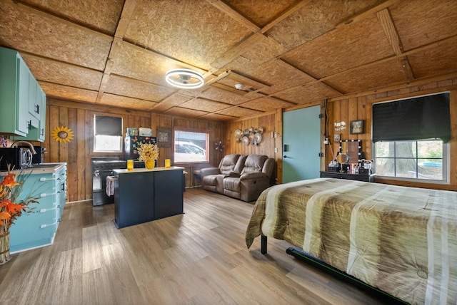 4231 Lylewood Rd, Indian Mound, TN 37079 - bedroom featuring a sink, wood finished floors, and wooden walls
