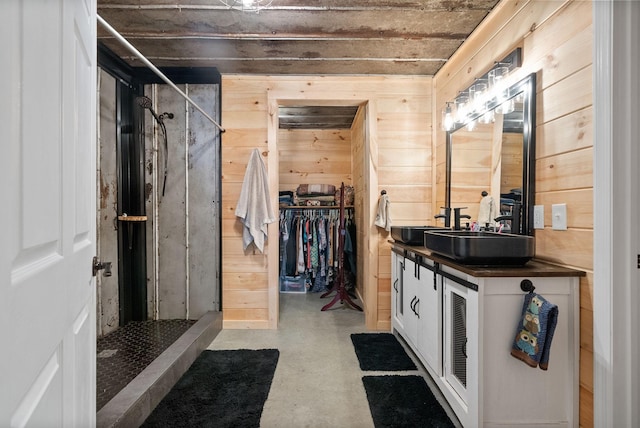 4231 Lylewood Rd, Indian Mound, TN 37079 - full bathroom featuring vanity, a shower stall, wood walls, and concrete flooring