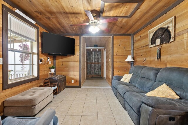 4231 Lylewood Rd, Indian Mound, TN 37079 - living room featuring wooden ceiling, a ceiling fan, wood walls, and light tile patterned flooring