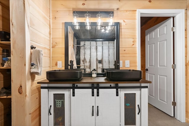 4231 Lylewood Rd, Indian Mound, TN 37079 - bathroom with wooden walls, double vanity, and a sink