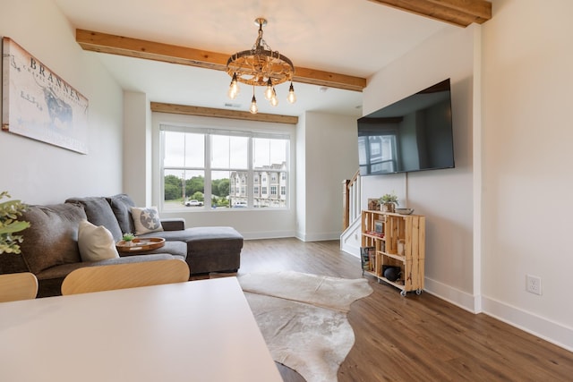 301 Harper Lndg Unit 301, Chapel Hill, TN 37034 - living area featuring beam ceiling, wood finished floors, and a chandelier