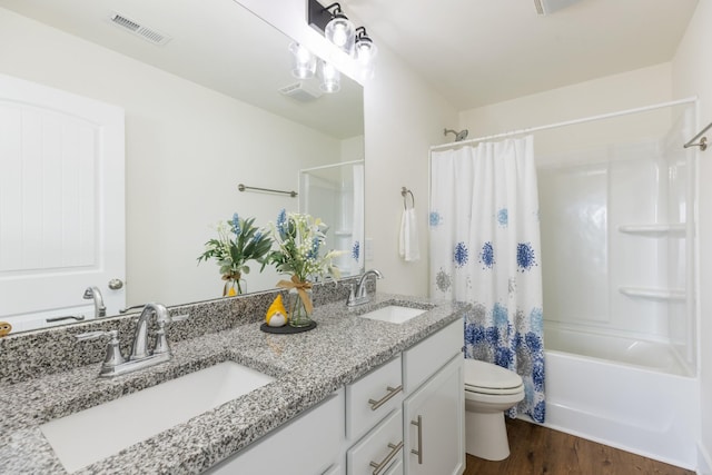 301 Harper Lndg Unit 301, Chapel Hill, TN 37034 - full bathroom with double vanity, wood finished floors, and shower / bath combination with curtain