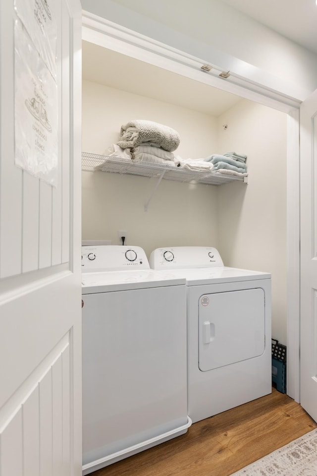 301 Harper Lndg Unit 301, Chapel Hill, TN 37034 - washroom with washer and clothes dryer and wood finished floors