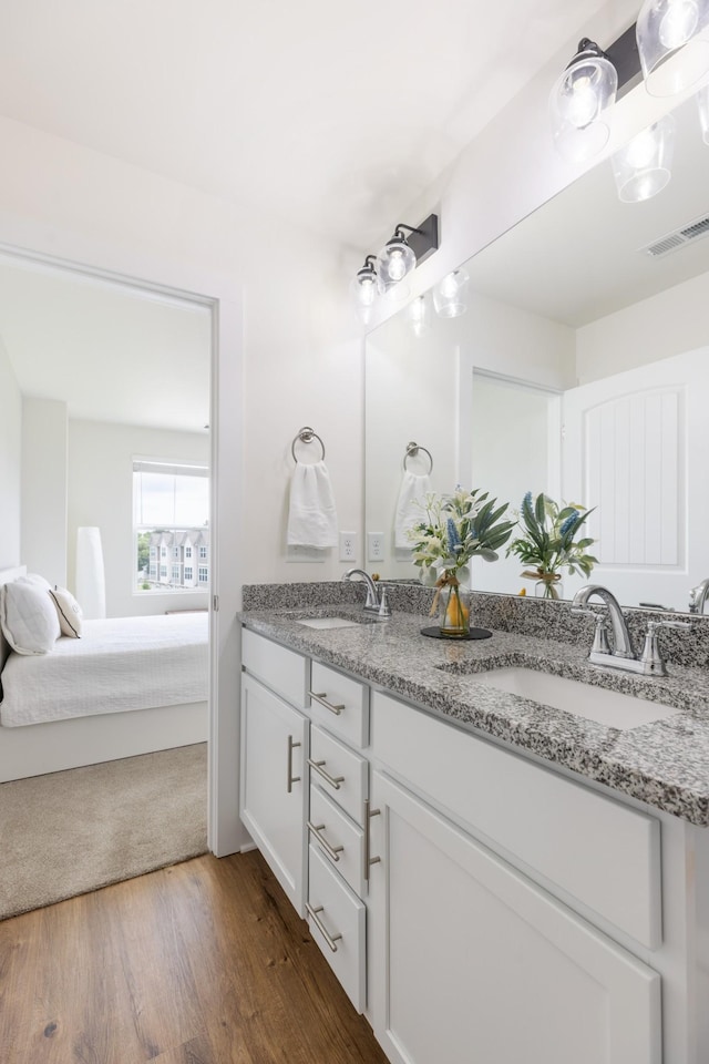 301 Harper Lndg Unit 301, Chapel Hill, TN 37034 - full bath with double vanity, ensuite bathroom, and wood finished floors