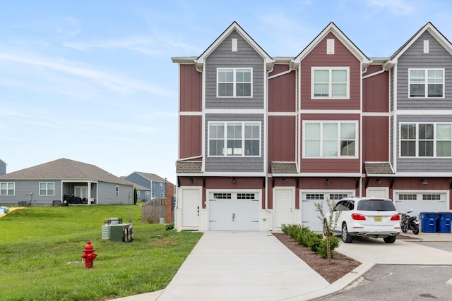 301 Harper Lndg Unit 301, Chapel Hill, TN 37034 - townhome / multi-family property with driveway, a garage, and a front yard