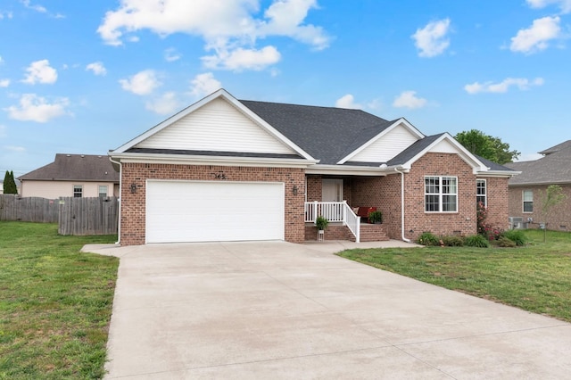 165 Daffodil Dr, Tullahoma, TN 37388 - view of front of home featuring brick siding, an attached garage, driveway, and central air condition unit