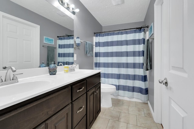165 Daffodil Dr, Tullahoma, TN 37388 - full bath featuring a textured ceiling, double vanity, toilet, tile patterned floors, and curtained shower