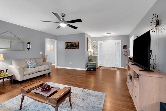 165 Daffodil Dr, Tullahoma, TN 37388 - living room with ceiling fan, wood finished floors, and baseboards