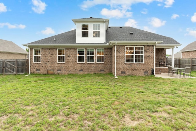 165 Daffodil Dr, Tullahoma, TN 37388 - back of property featuring crawl space, a patio, brick siding, and a shingled roof