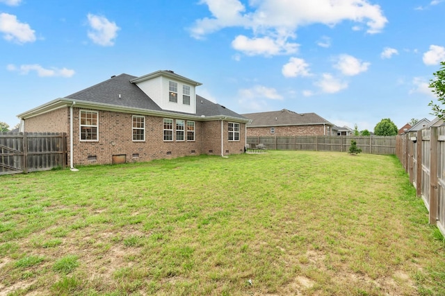 165 Daffodil Dr, Tullahoma, TN 37388 - rear view of house with crawl space and brick siding