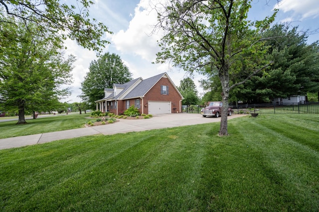 view of front of property with fence, driveway, a front lawn, and brick siding
