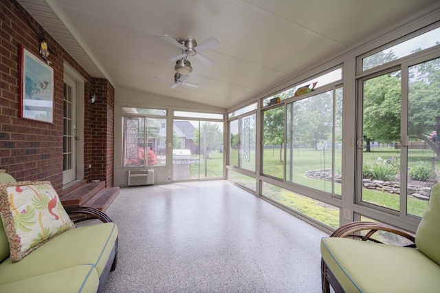 sunroom with ceiling fan and plenty of natural light