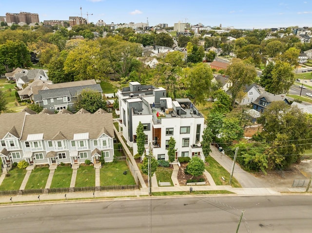 birds eye view of property with a residential view