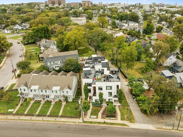 birds eye view of property with a view of city and a residential view