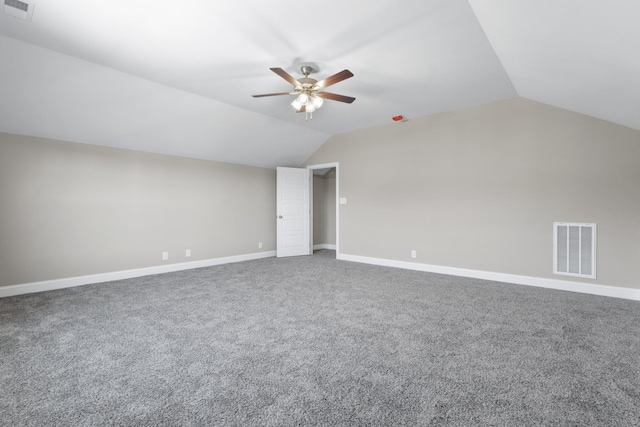 bonus room featuring carpet flooring, a ceiling fan, visible vents, and lofted ceiling