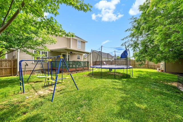 2764 Ann Dr, Clarksville, TN 37040 - view of yard with a playground, a trampoline, ceiling fan, and a fenced backyard