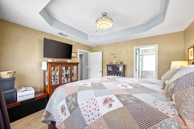 2764 Ann Dr, Clarksville, TN 37040 - carpeted bedroom with a raised ceiling