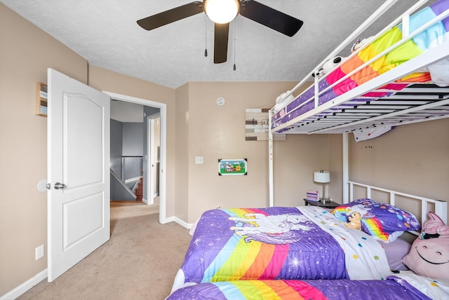 2764 Ann Dr, Clarksville, TN 37040 - carpeted bedroom with baseboards and ceiling fan