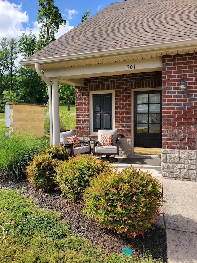 201 Birdie Ct, Dickson, TN 37055 - property entrance with brick siding and roof with shingles