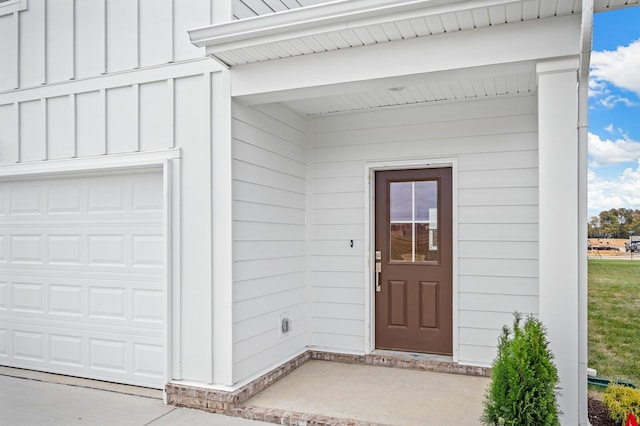 property entrance with board and batten siding