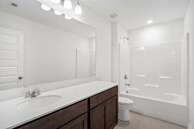 full bathroom with toilet, tile patterned floors, visible vents, and vanity