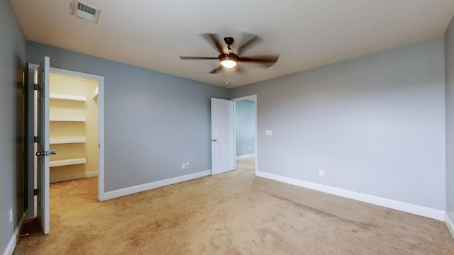 unfurnished bedroom with visible vents, baseboards, and carpet floors