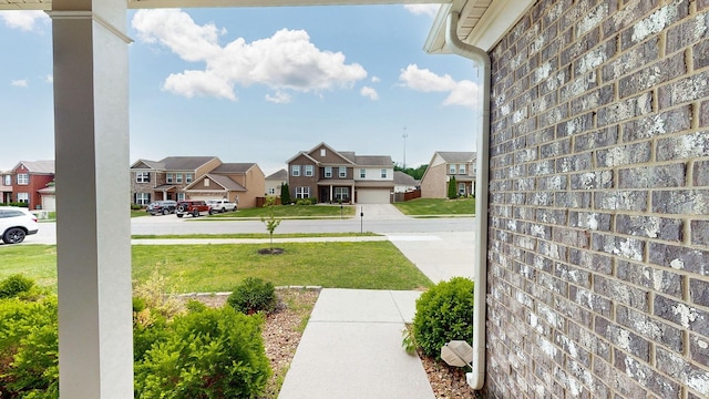 view of yard with a residential view