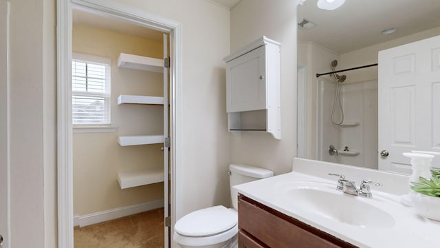 bathroom featuring vanity, visible vents, a shower, toilet, and baseboards