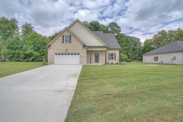 traditional-style house with driveway, brick siding, and a front yard